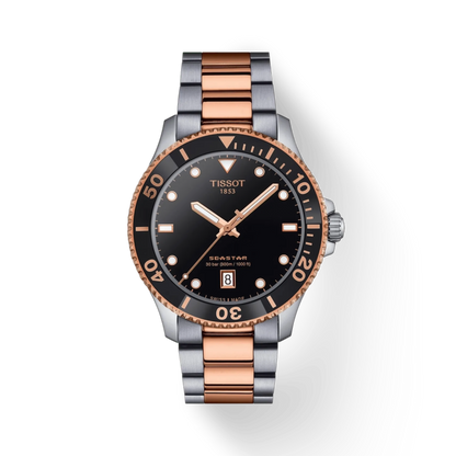 Tissot watch with black dial and rose gold accents on a white background