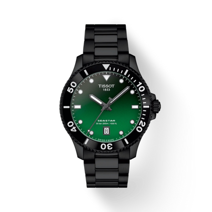 Black Tissot watch with green dial on a white background
