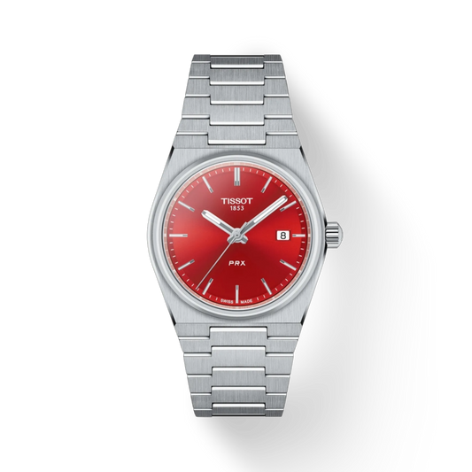 Tissot watch with red face and silver bracelet on a white background