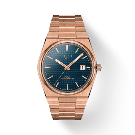 Rose gold Tissot watch with blue dial on a white background