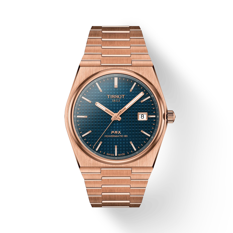 Rose gold Tissot watch with blue dial on a white background