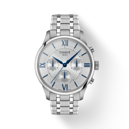 Silver Tissot watch with blue hands on a white background