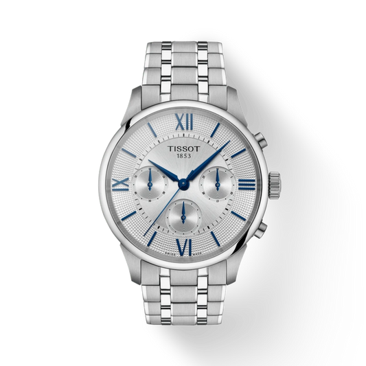 Silver Tissot watch with blue hands on a white background