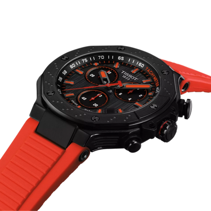 Tissot watch with red strap and black dial on a white background
