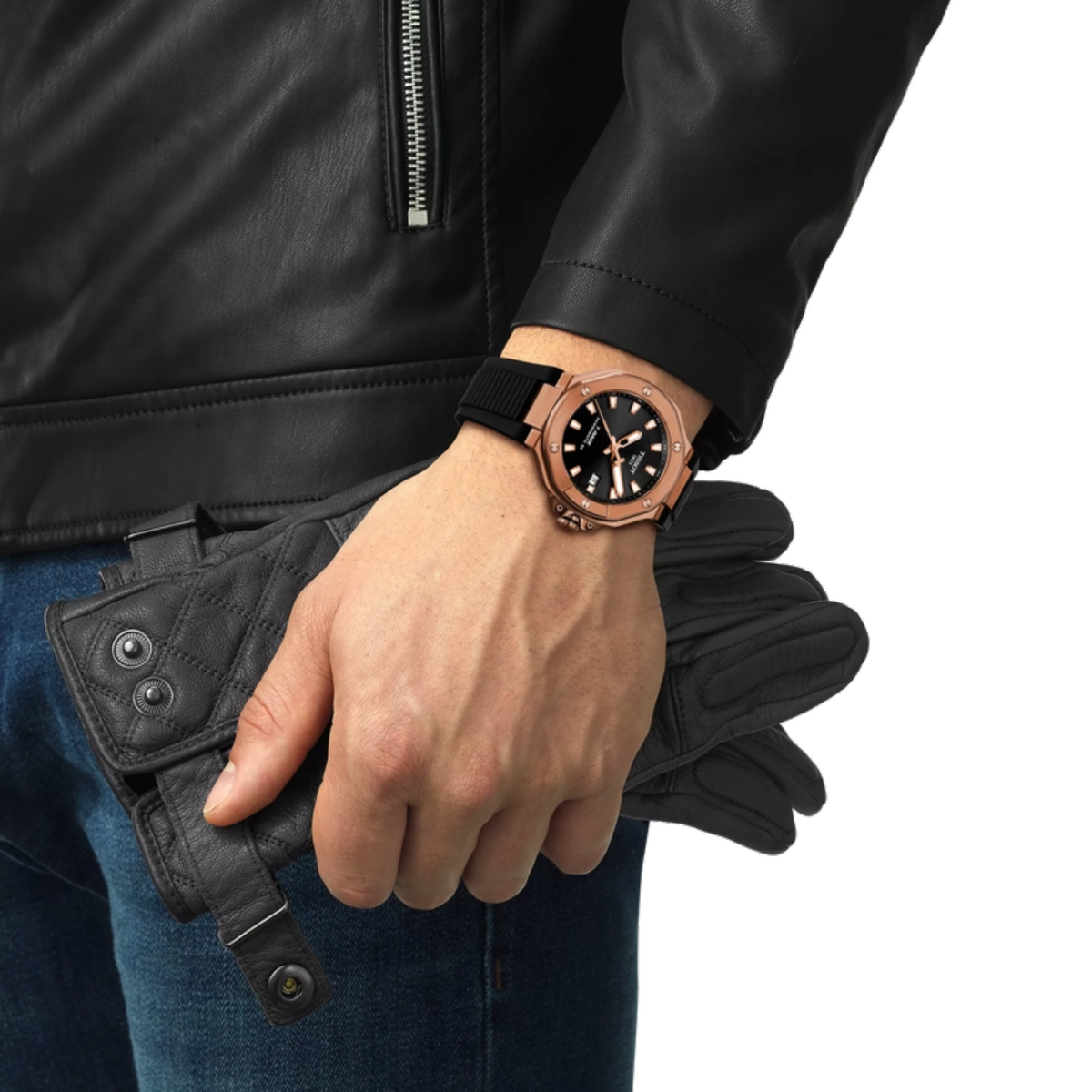 Hand wearing a rose gold watch with a black strap, holding a black leather wallet against a white background.
