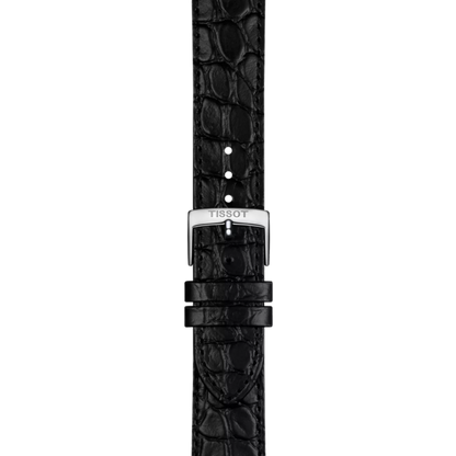 Black crocodile-patterned watch strap with Tissot logo on a white background