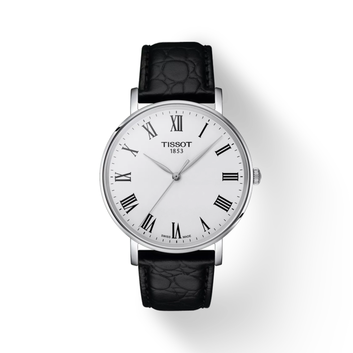 Tissot watch with black leather strap on a white background