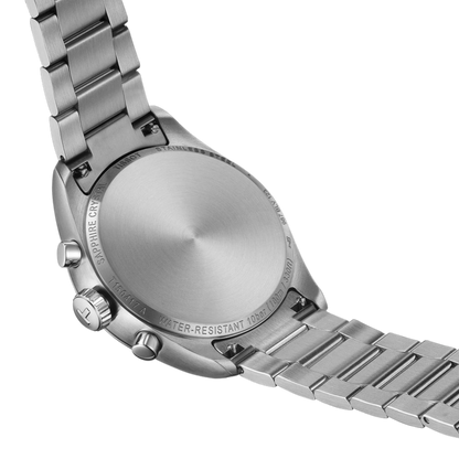 Close-up of a silver watch with a metal bracelet on a white background