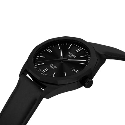 Black Tissot watch on a white background