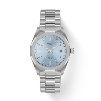 Silver Tissot watch with a light blue face on a white background