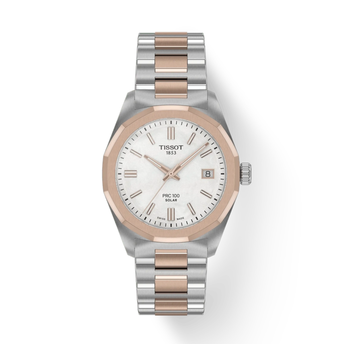 Tissot watch with silver and rose gold band on white background