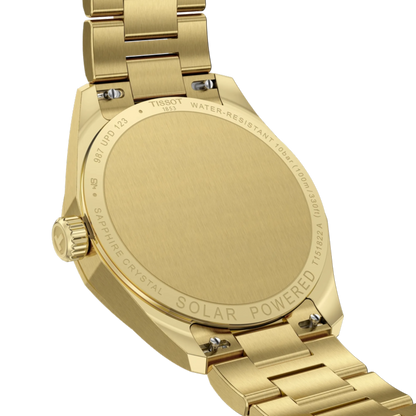Gold watch with 'Tissot' branding on a white background