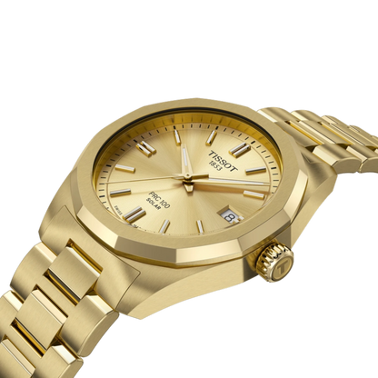 Gold Tissot watch on a white background