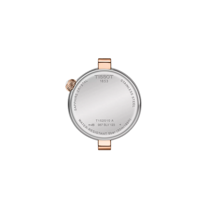 Tissot watch caseback on a white background
