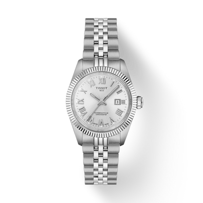 Silver Tissot watch with a white face on a white background