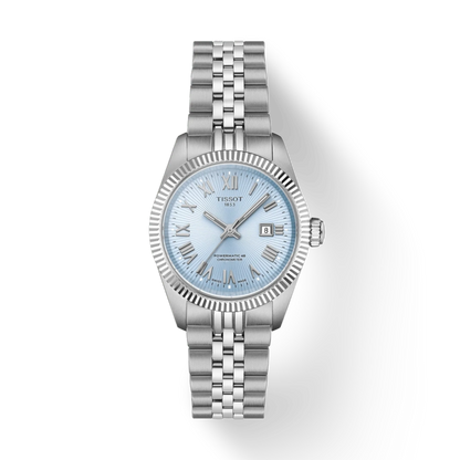 Silver watch with a light blue face on a white background