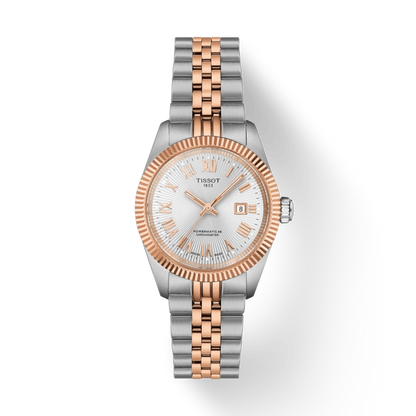 Two-tone watch with silver and rose gold band on a white background