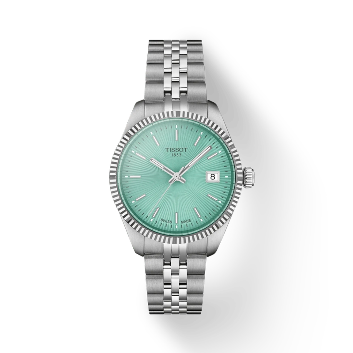 Tissot watch with silver bracelet and green face on a white background