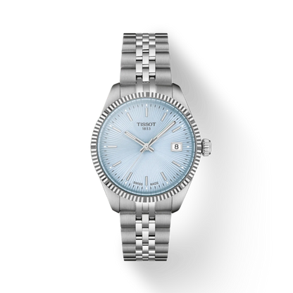 Silver Tissot watch with light blue dial on a white background