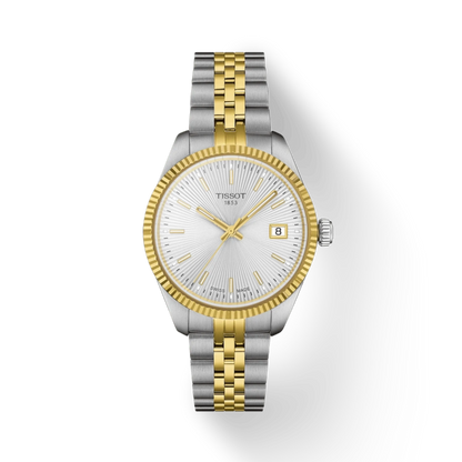 Two-tone silver and gold watch with Tissot logo on a white background