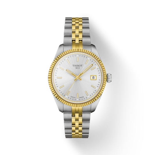 Two-tone silver and gold watch with Tissot logo on a white background