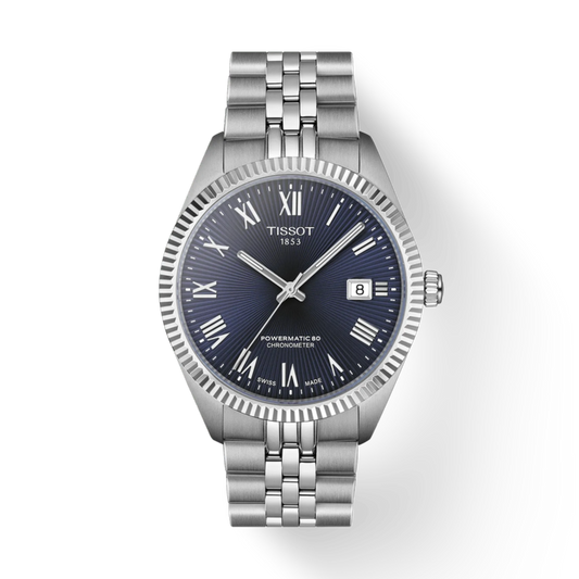 Silver Tissot watch with blue dial on a white background