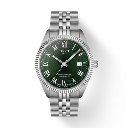 Tissot watch with green dial and silver bracelet on a white background