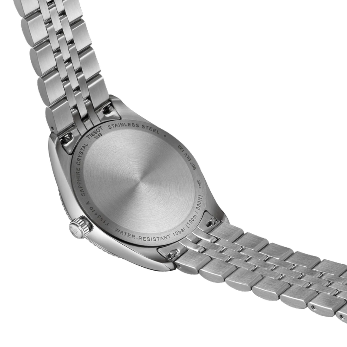 Close-up of a silver watch with a metal band on a white background