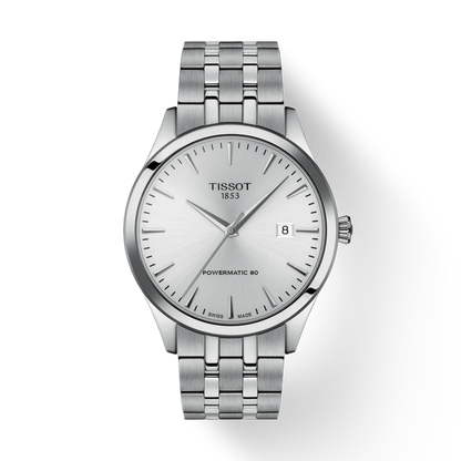Silver Tissot watch with a white face on a light gray background
