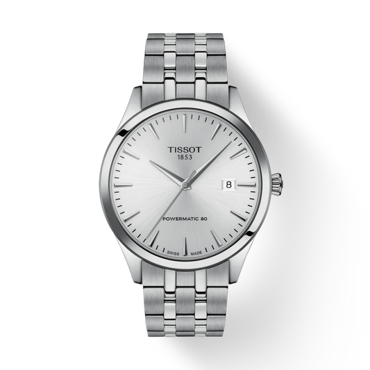 Silver Tissot watch with a white face on a light gray background