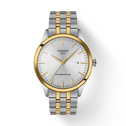 Tissot watch with two-tone metal strap on a white background