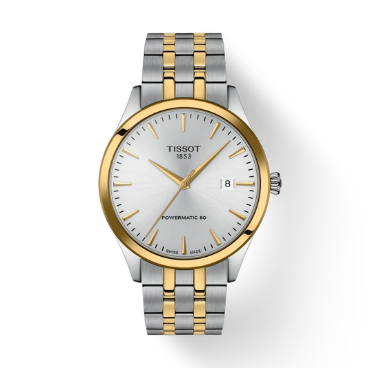 Tissot watch with two-tone metal strap on a white background