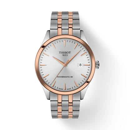 Tissot watch with two-tone rose gold and silver bracelet on a white background