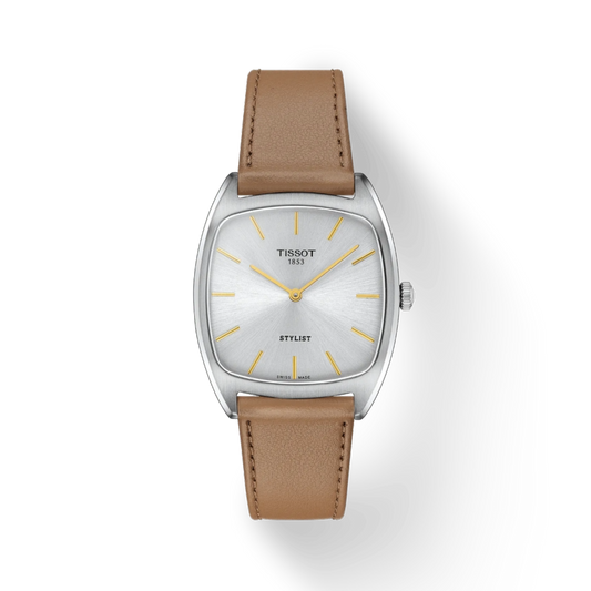 Tissot watch with brown leather strap on a white background