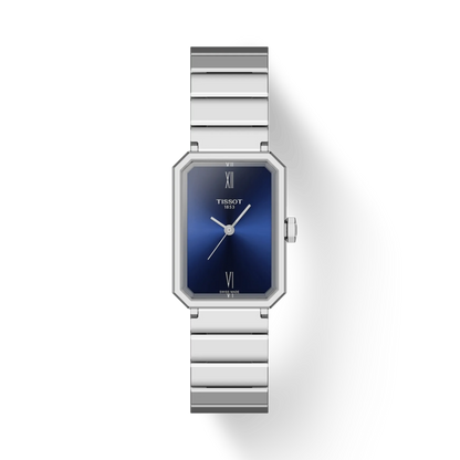 Silver Tissot watch with blue face on a white background