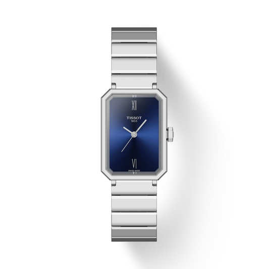 Silver Tissot watch with blue face on a white background