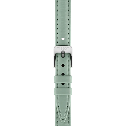 Mint green watch strap with silver clasp on a white background