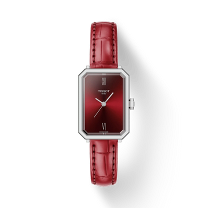 Red wristwatch with silver case on a white background