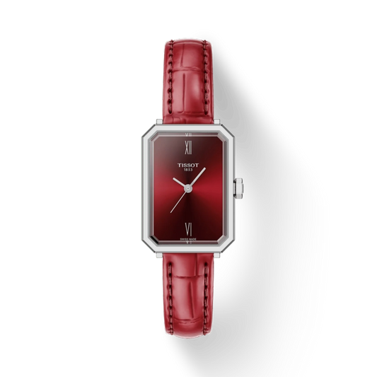 Red wristwatch with silver case on a white background