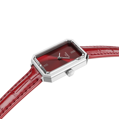 Watch with red strap and red face on a white background