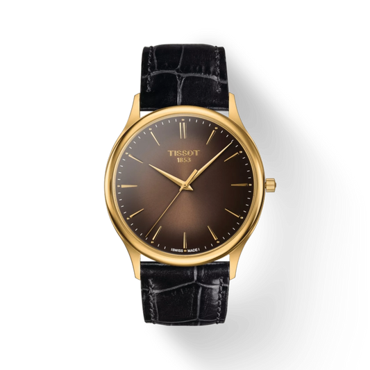 Tissot watch with gold case and black leather strap on a white background