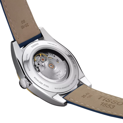 Close-up of a Tissot watch with visible brand name and model details.