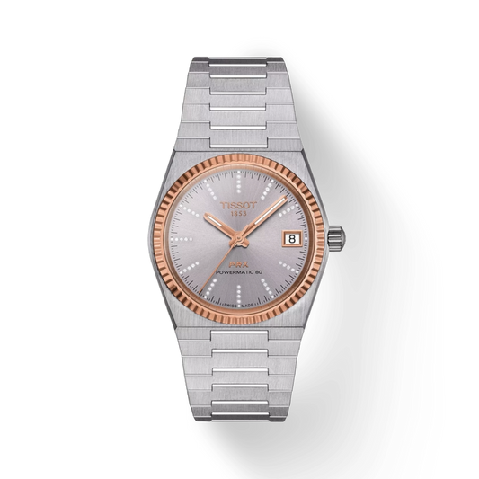 Silver and rose gold Tissot watch on a white background
