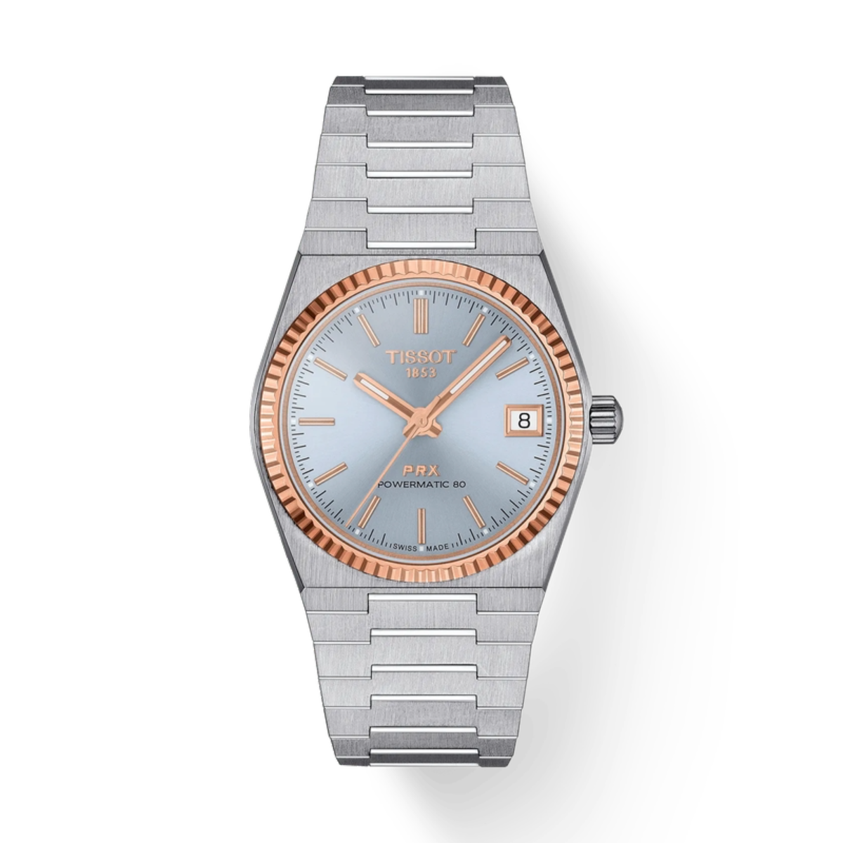 Silver and rose gold Tissot watch on a white background