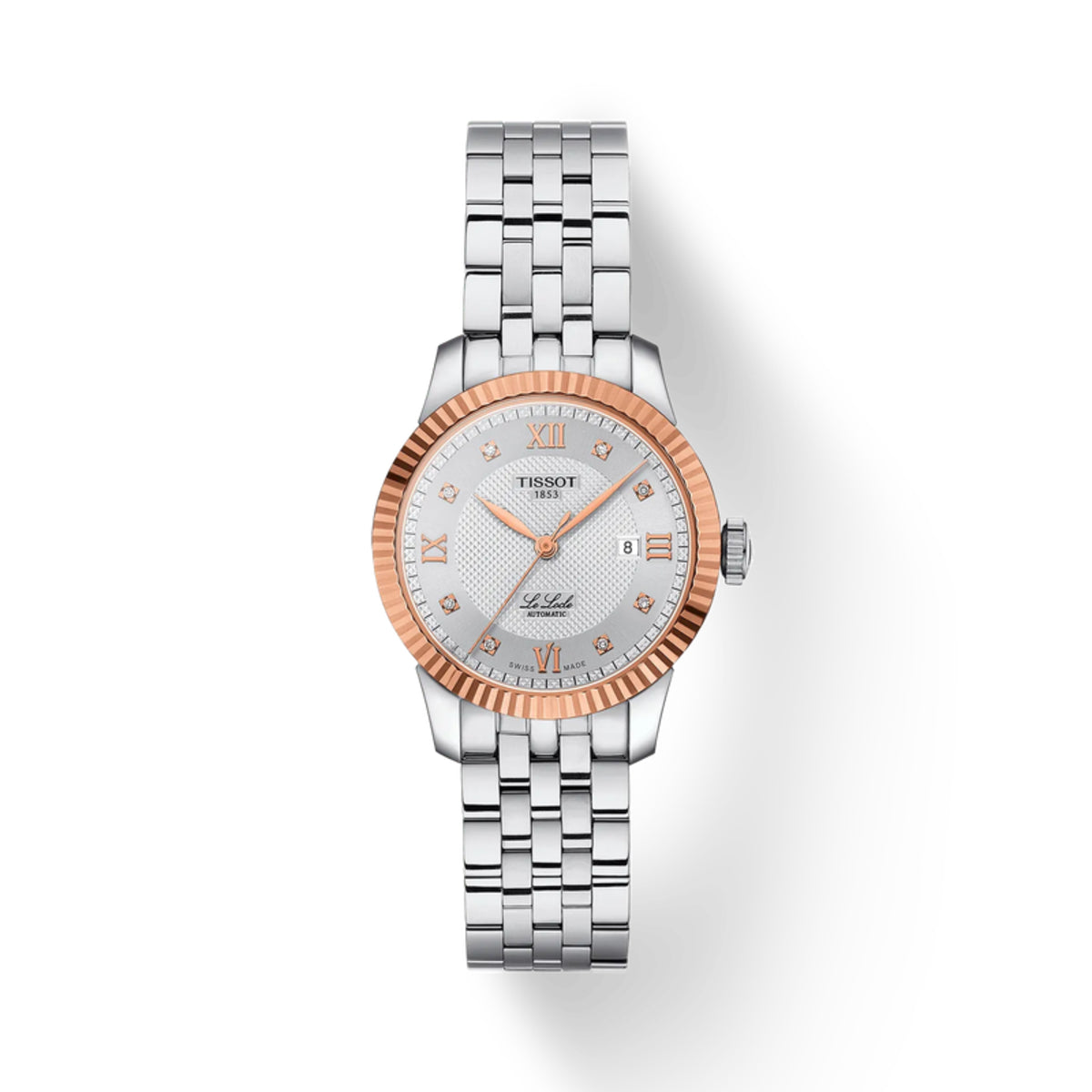 Silver and rose gold watch with Tissot branding on a white background