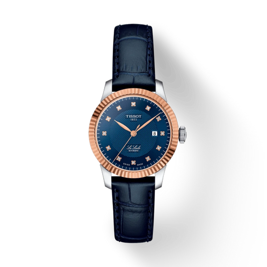 Luxury watch with blue dial and rose gold bezel on a white background