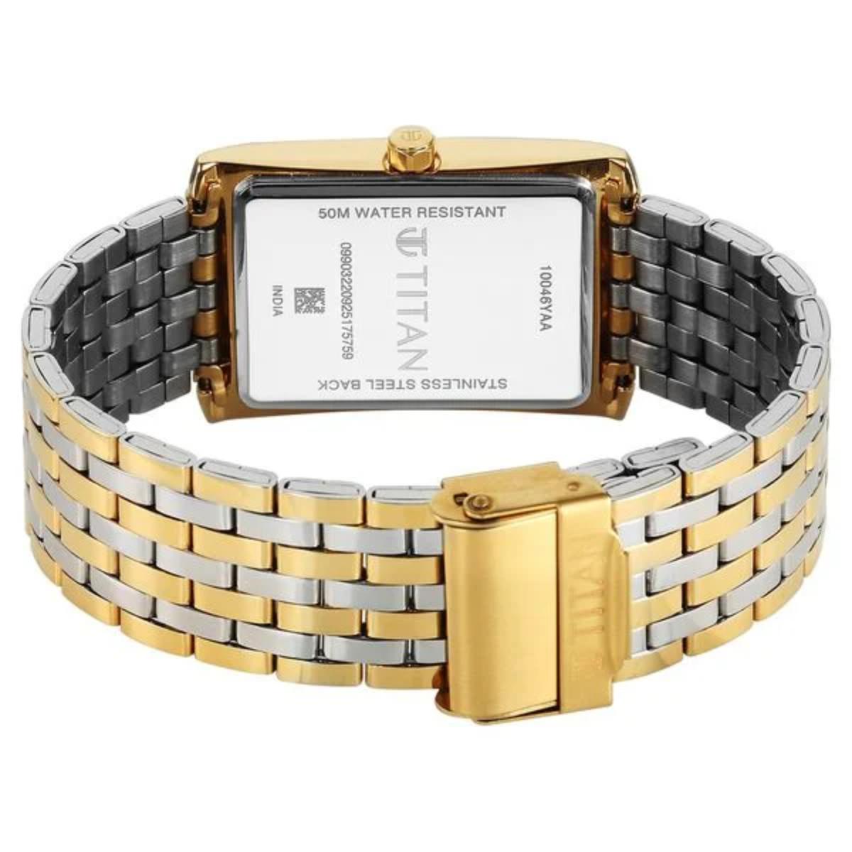 Two-tone gold and silver watch with visible Titan branding on a white background