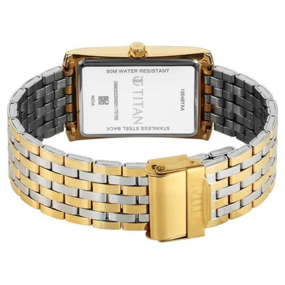 Two-tone gold and silver watch with visible Titan branding on a white background