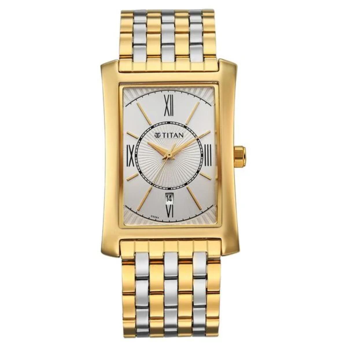 Gold and silver watch with a white face on a white background