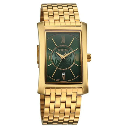 Gold wristwatch with a green face on a white background